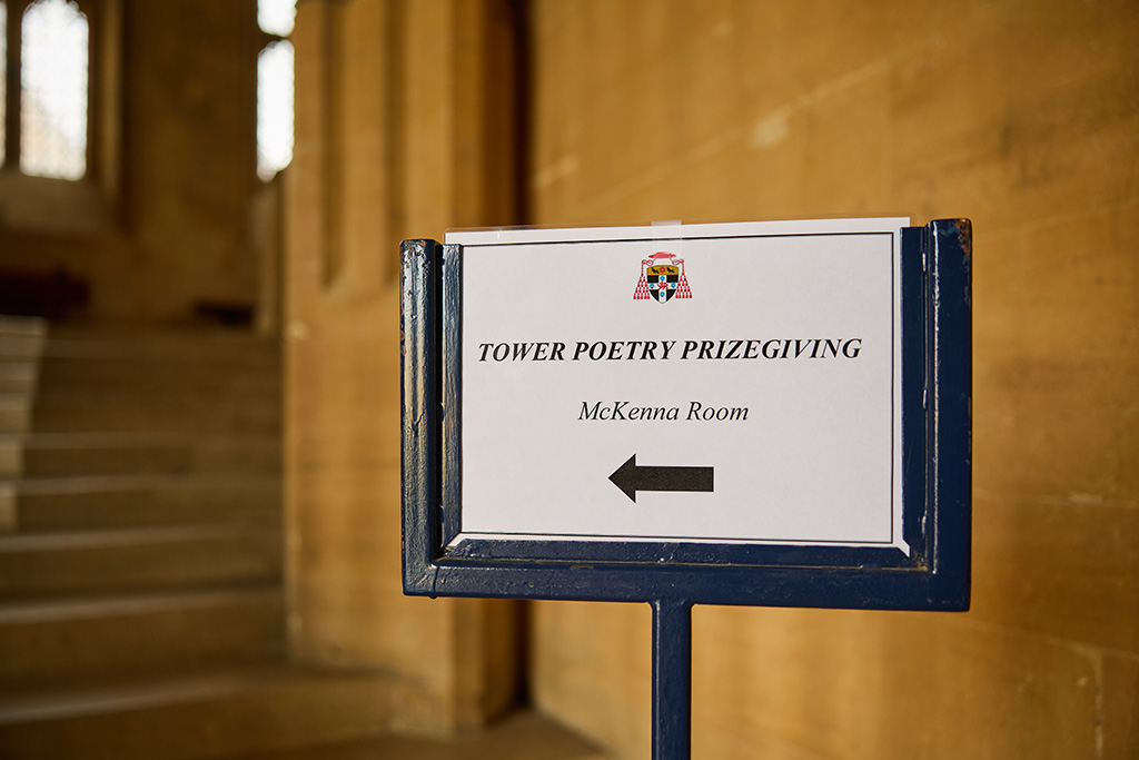 Sign pointing towards the Tower Poetry prizegiving event