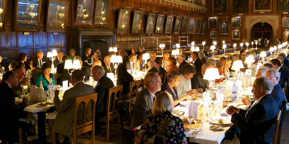 Guests taking dinner in the Great Hall
