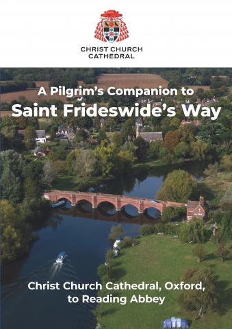 The front cover of the Companion to Saint Frideswide's Way. It shows an aerial photo of Gilbert Scott's 19th century red brick bridge of the Thames in Clifton Hampden.