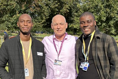 Professor Mike English with Dr Mudji E’kitiak (right) and Dr David Kamate (left) 