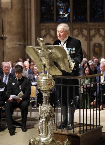 The High Sheriff of Oxfordshire, Mr James Macnamara, gives a reading from the Cathedral's silver eagle lectern.