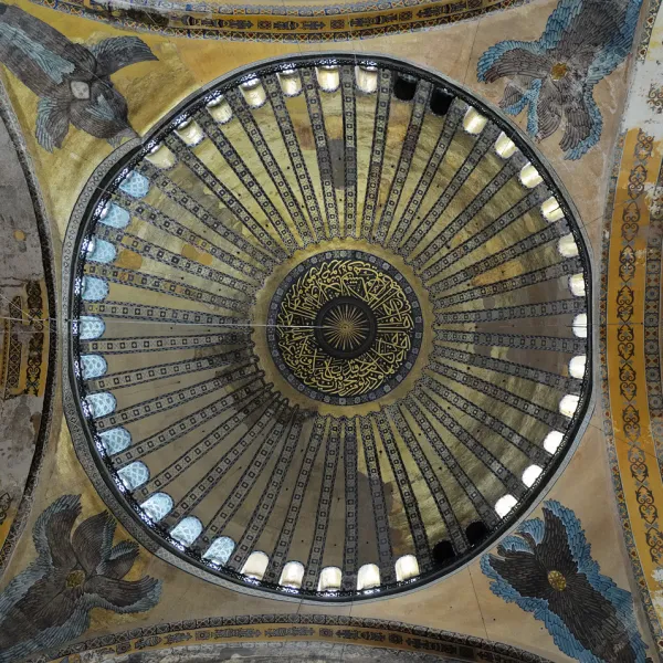 The golden painted interior of the dome of the Hagia Sofia in Istanbul, with a 6 winged seraphs on each corner